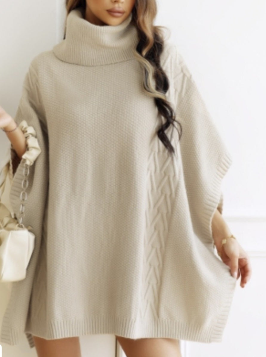 Poncho kabelstickad Beige